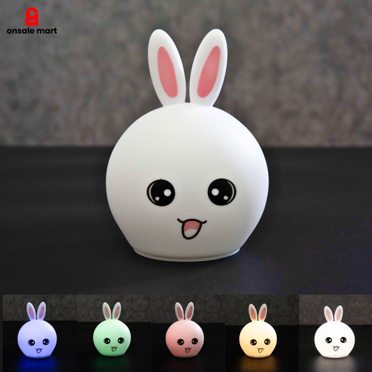 Cute Bunny Night Light silicone rabbit lamp in white with color changing LED options displayed below.