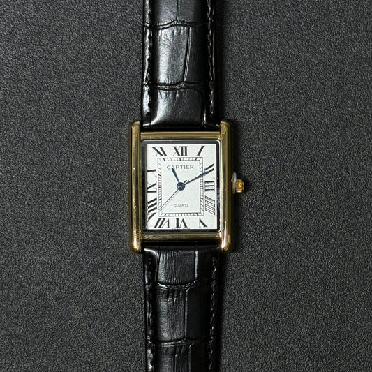 Luxury inspired replica watch with black crocodile texture leather strap, white rectangular dial and Roman numeral hour markers