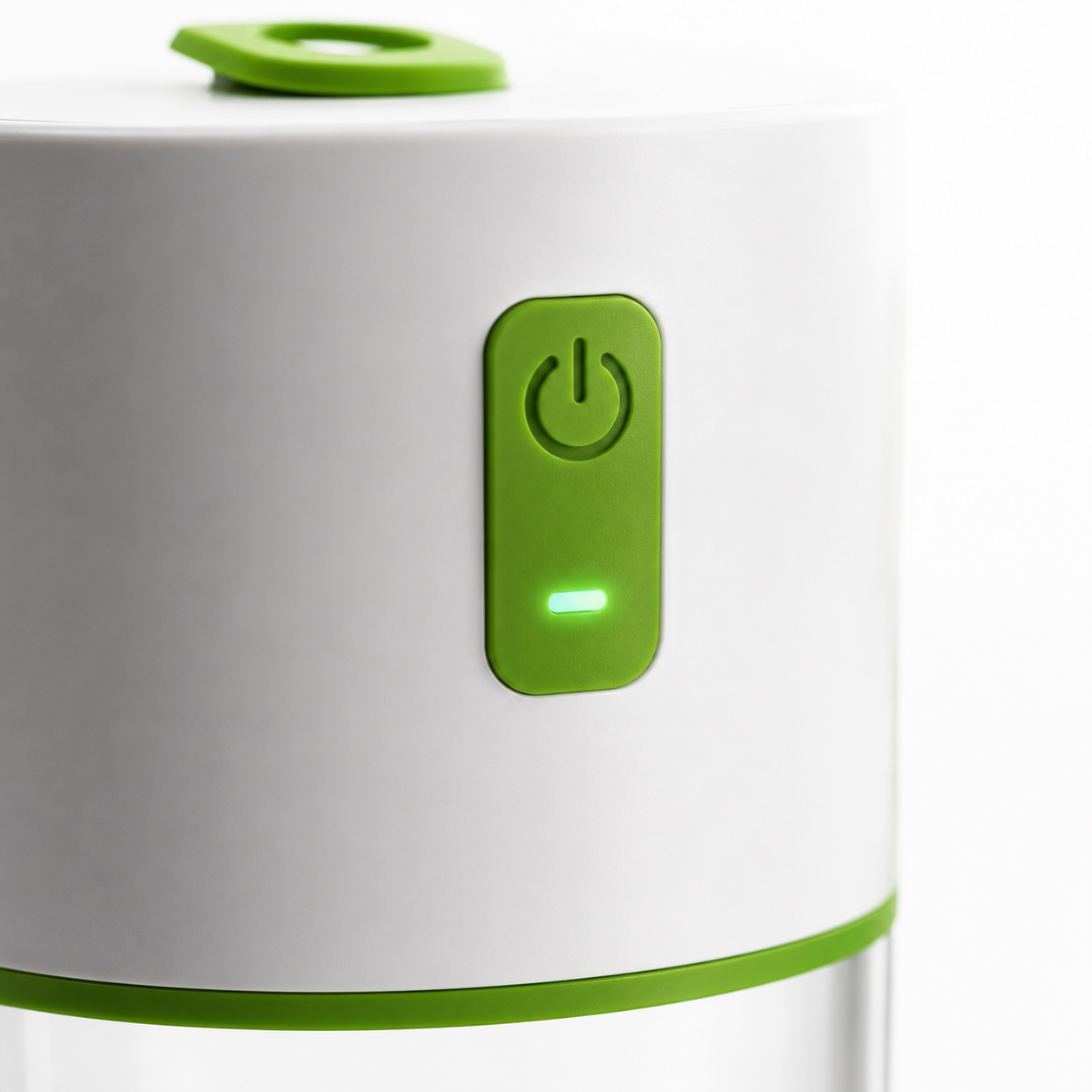 Close-up of the portable juicer blender power button with green LED indicator on a white body, highlighting the one-touch operation and modern minimalist design.