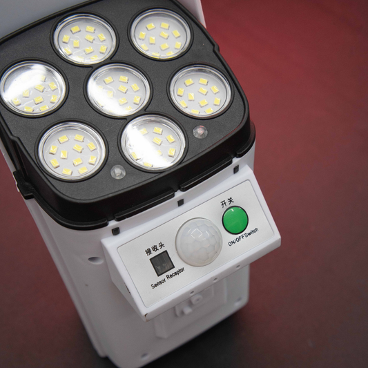 Close-up macro view of Motion Detection LED Solar Light showing PIR motion sensor LED array and ON OFF control switch