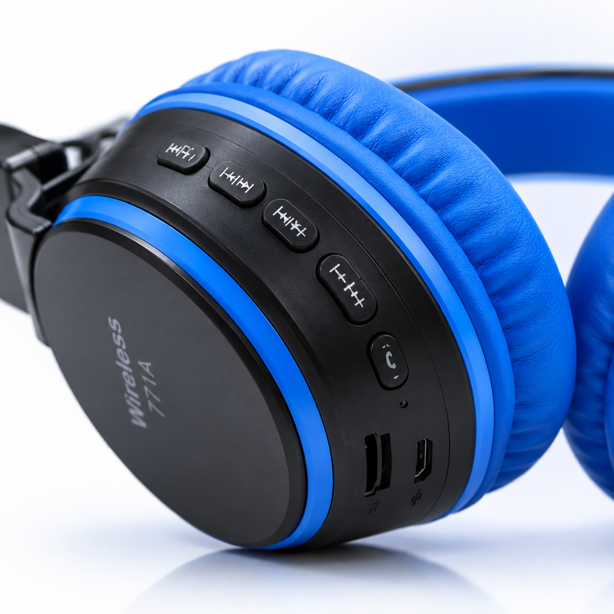 Macro product photo of the Wireless 771A Bluetooth headphones showing onboard playback controls, volume buttons, power button, TF card slot, charging port, and built-in microphone on the earcup.