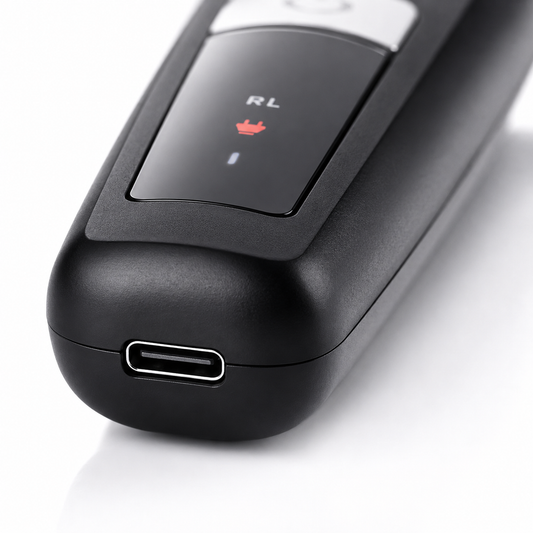 Close-up macro image of the Rock Light RL-TM9200 Professional Hair Trimmer featuring a USB Type-C charging port, matte black body, LED charging indicator, and premium textured finish