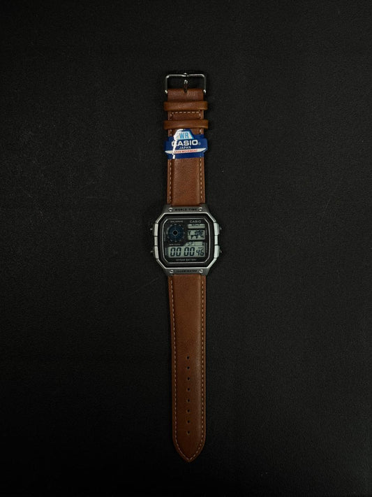 Light brown leather strap replica watch with vintage digital display