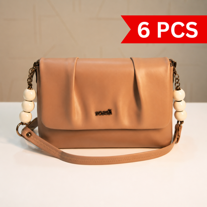 Front view of a nude beige women's shoulder bag featuring a pleated flap design, decorative white beaded chain handles, smooth leather-look finish, and detachable shoulder strap.
