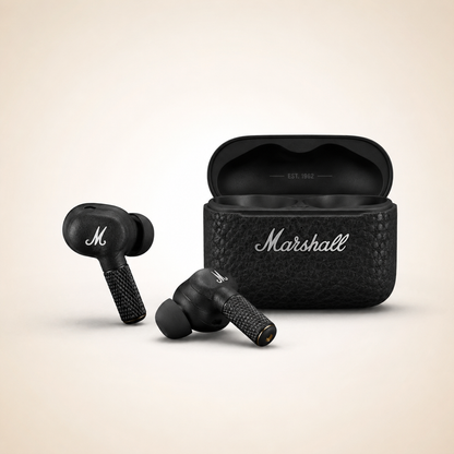 Premium true wireless earbuds displayed beside an open textured black charging case with a leather-inspired finish. Features ergonomic in-ear design, compact charging case, and elegant studio lighting
