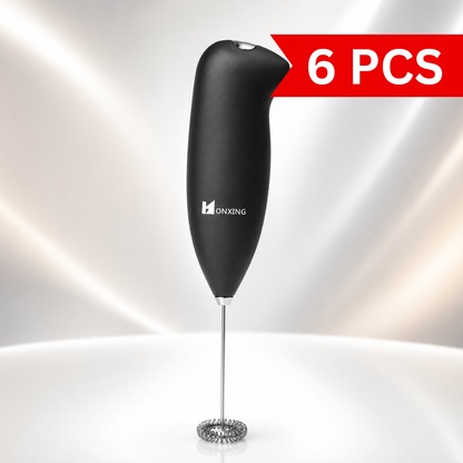 Premium handheld battery-operated milk frother featuring a soft-touch black ergonomic handle and stainless steel whisk, ideal for frothing milk for cappuccino, latte, hot chocolate, and coffee beverages.