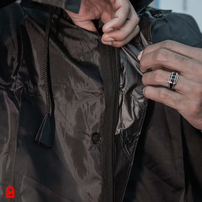 Black Full Sleeve Raincoat Jacket waterproof zipper close-up with snap button protection for monsoon use