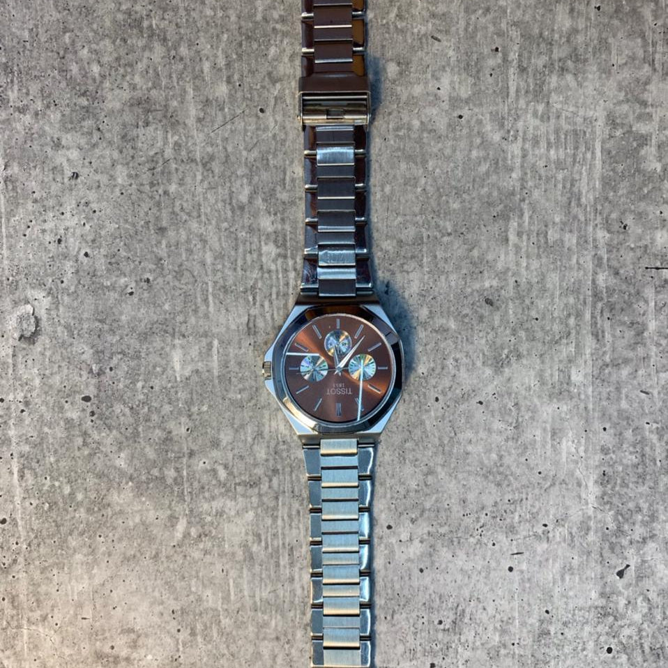 Brown Dial Steel Chronograph Watch stainless steel bracelet with brown sunburst dial and sub-dials.