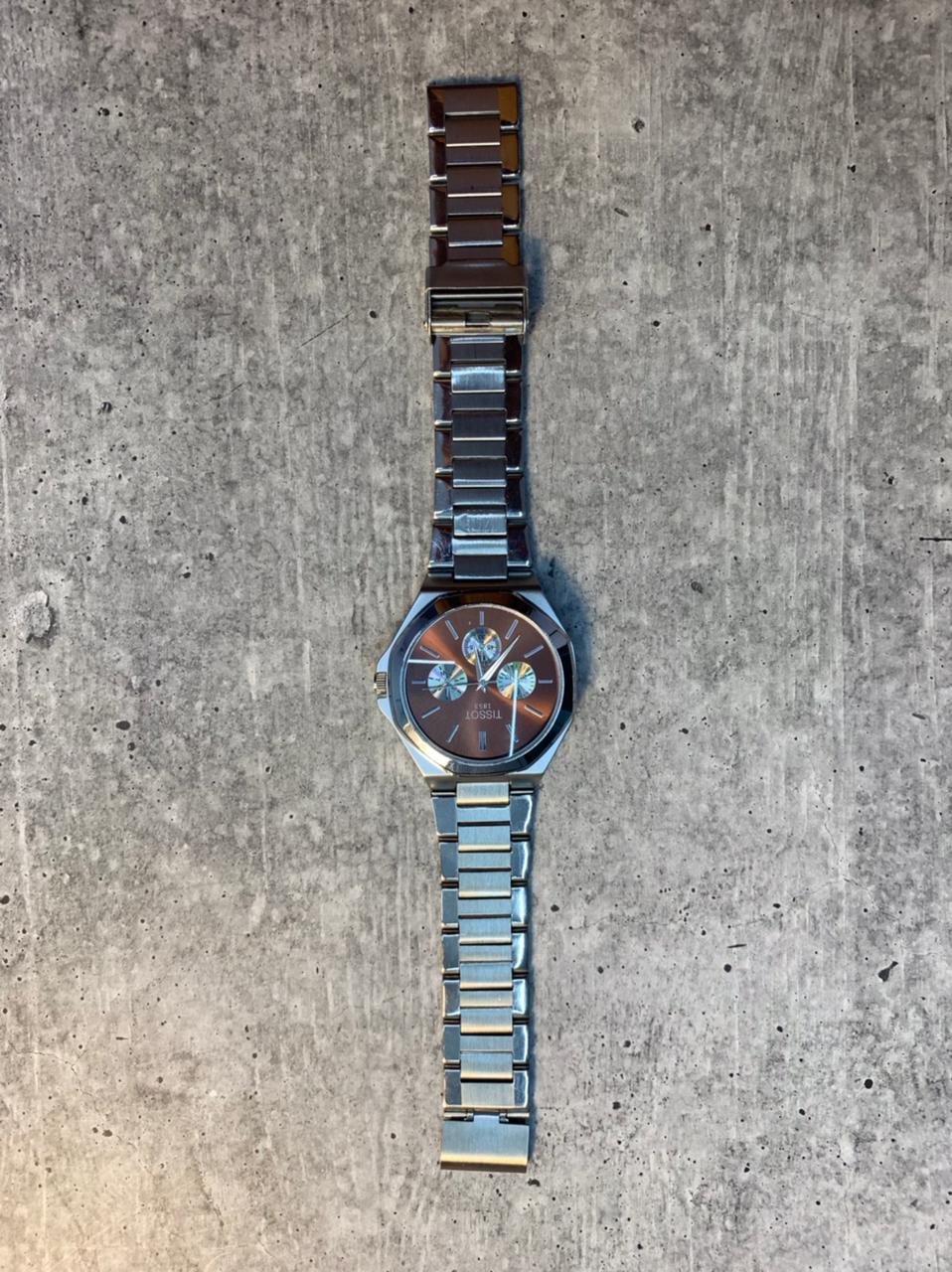 Brown Dial Steel Chronograph Watch stainless steel bracelet with brown sunburst dial and sub-dials.