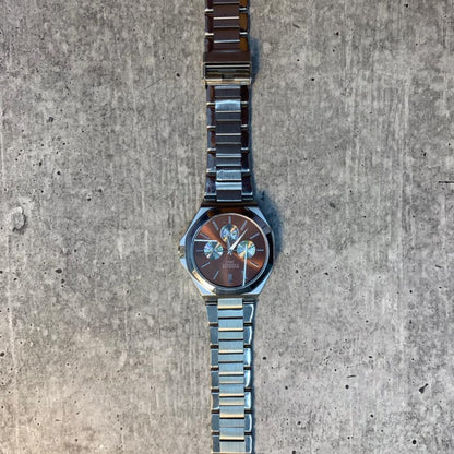 Brown Dial Steel Chronograph Watch stainless steel bracelet with brown sunburst dial and sub-dials.