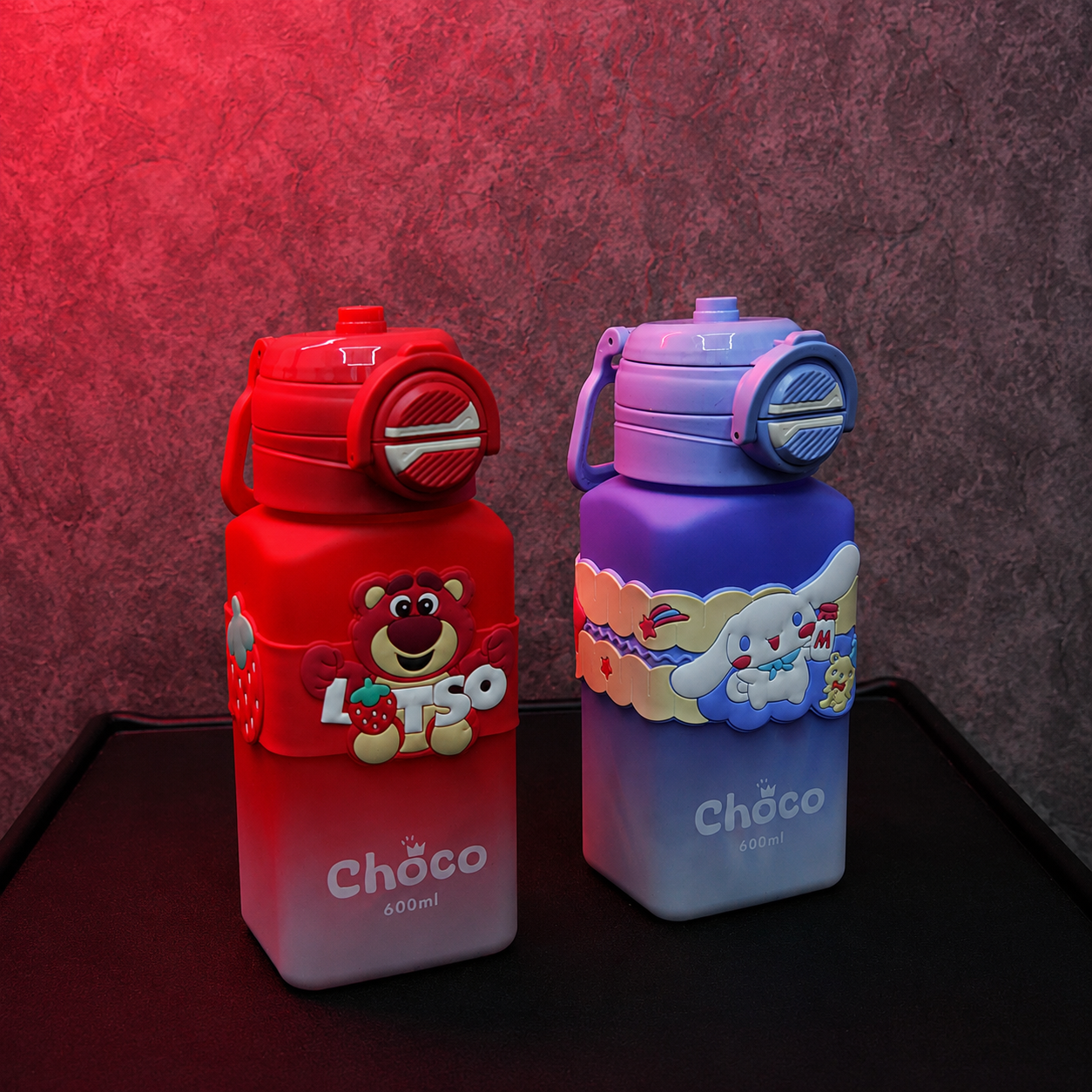 Purple Cartoon Strap Water Bottle for Kids 600ml with adorable bunny character band, reusable straw and portable carry handle.