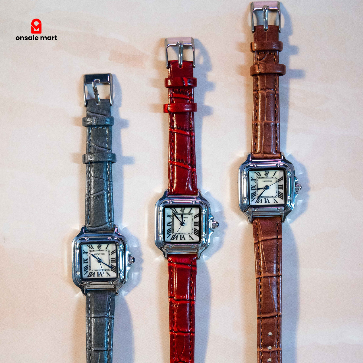 Leather square watch showing multiple strap color options with silver-tone case.