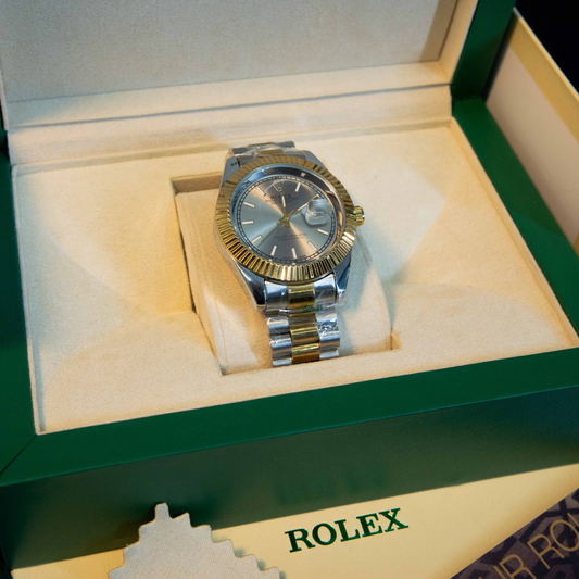 Classic silver dial two-tone men’s watch with gold fluted bezel in luxury watch box