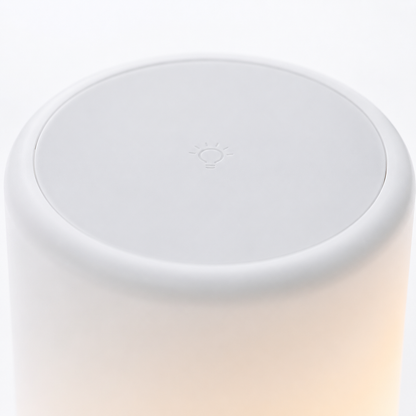 Close-up top view of the touch-sensitive control surface on the portable LED lamp speaker, designed for easy touch operation to adjust lighting modes and brightness.