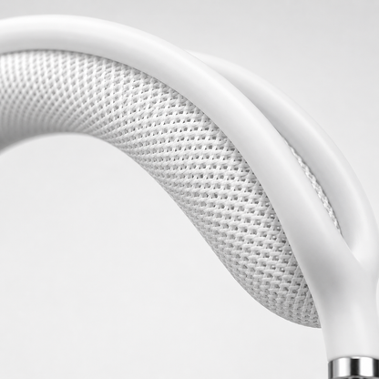 Extreme macro close-up of the breathable mesh canopy headband on premium white over-ear wireless Bluetooth headphones, highlighting the woven fabric texture, ergonomic cushioning, and high-quality craftsmanship.