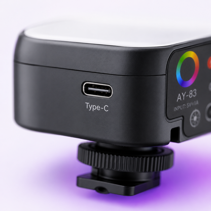 Close-up of the AY-83 LED pocket video light highlighting the USB Type-C charging port and premium build quality.