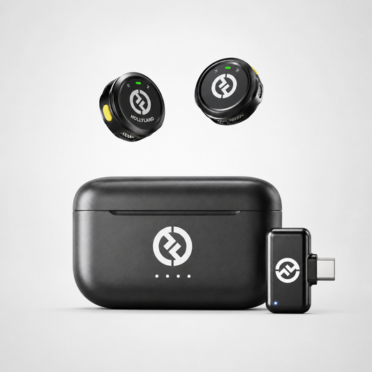 Compact wireless lavalier microphone system featuring two button-sized transmitters, USB-C receiver adapter, and portable charging case displayed on a clean white background.