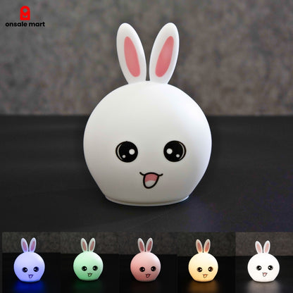 Cute Bunny Night Light silicone rabbit lamp in white with color changing LED options displayed below.