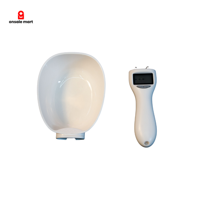 Digital measuring spoon with LCD display and detachable scoop on white background.