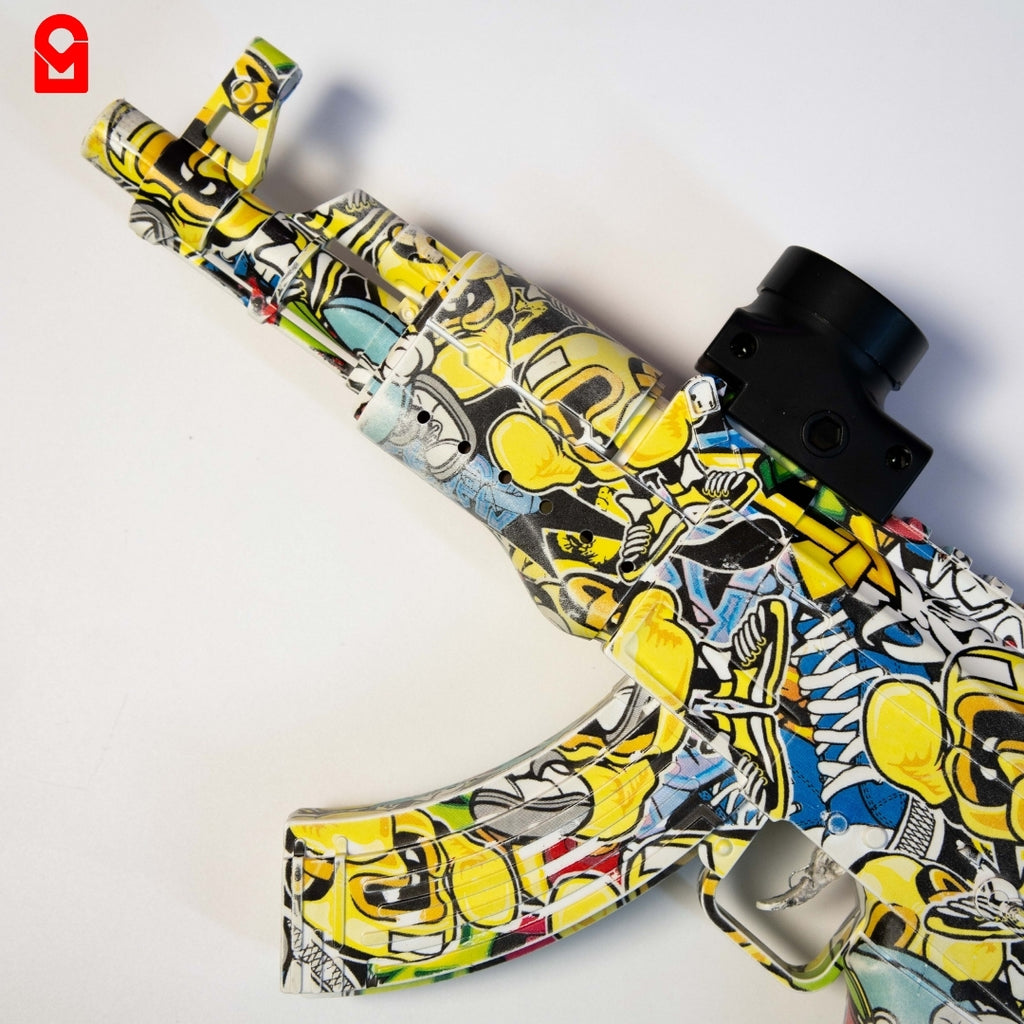 Close-up view of gel blaster toy gun showing grip, magazine and body pattern design.