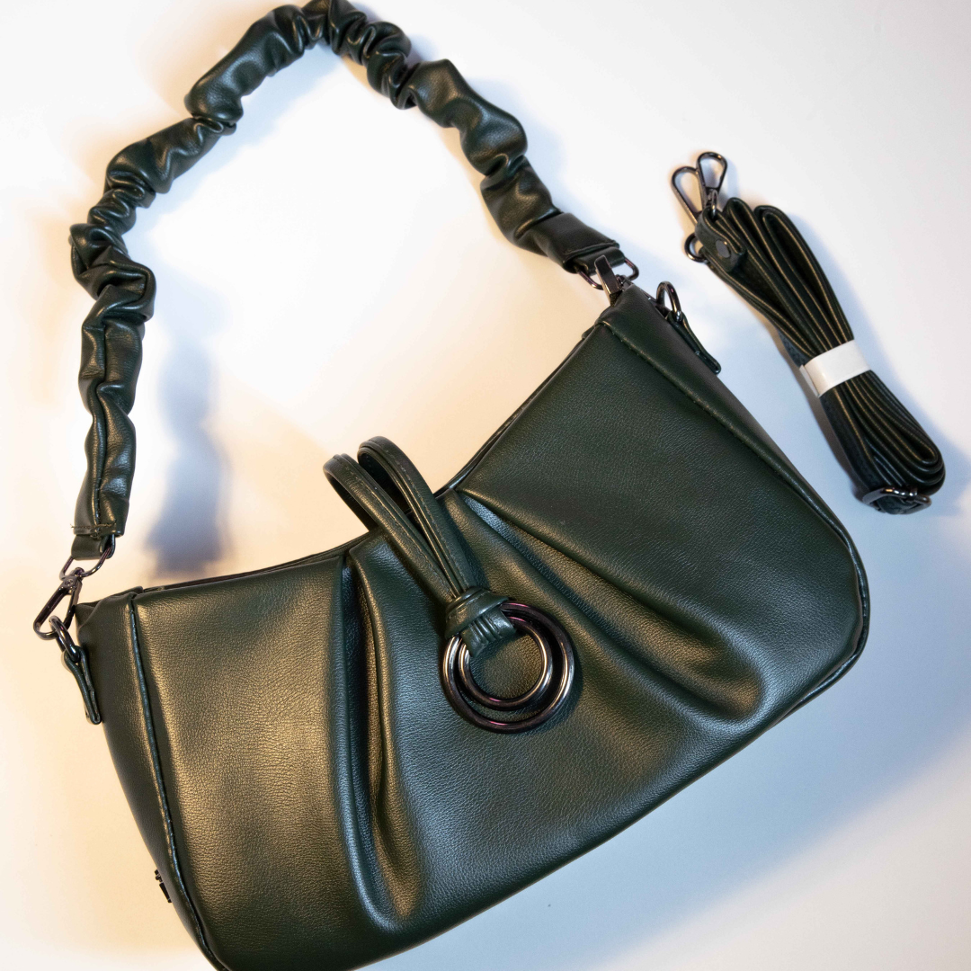 Emerald green ruched ring shoulder bag with detachable long strap.