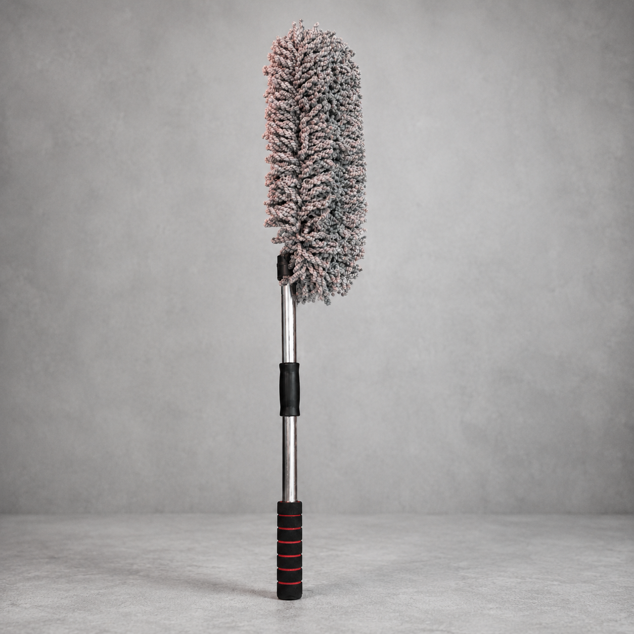 Extendable Microfiber Car Cleaning Duster with telescopic stainless steel handle and grey chenille microfiber head, isolated in a premium studio setting for automotive dust cleaning.