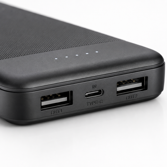 Close-up of the power bank showing dual USB output ports, USB Type-C input port and four LED battery level indicators for convenient charging and status monitoring.