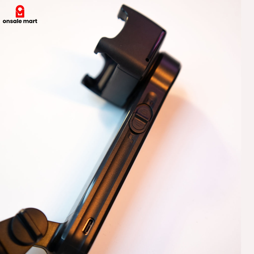 Side buttons and charging port on gimbal stabilizer selfie stick for smartphones