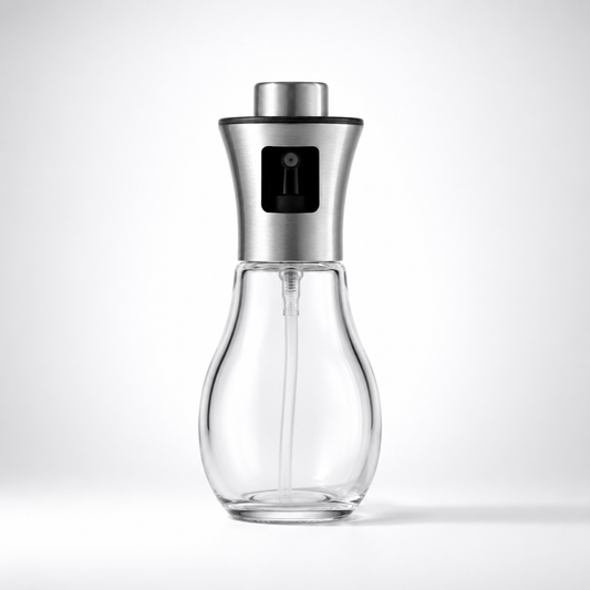 Glass Cooking Oil Mister Bottle with stainless steel spray head, empty transparent glass container, reusable kitchen oil sprayer dispenser isolated on white background.