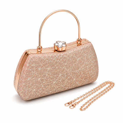 Women's rose gold evening clutch bag with detachable chain strap and crystal flower closure, isolated on a clean white background.