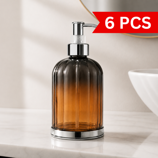 Hand Wash Storage Dispenser Bottle with amber transparent body and chrome pump displayed on luxury bathroom vanity countertop