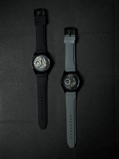 Replica watch collection featuring black and grey silicone straps, skeleton dials and luxury sports watch design
