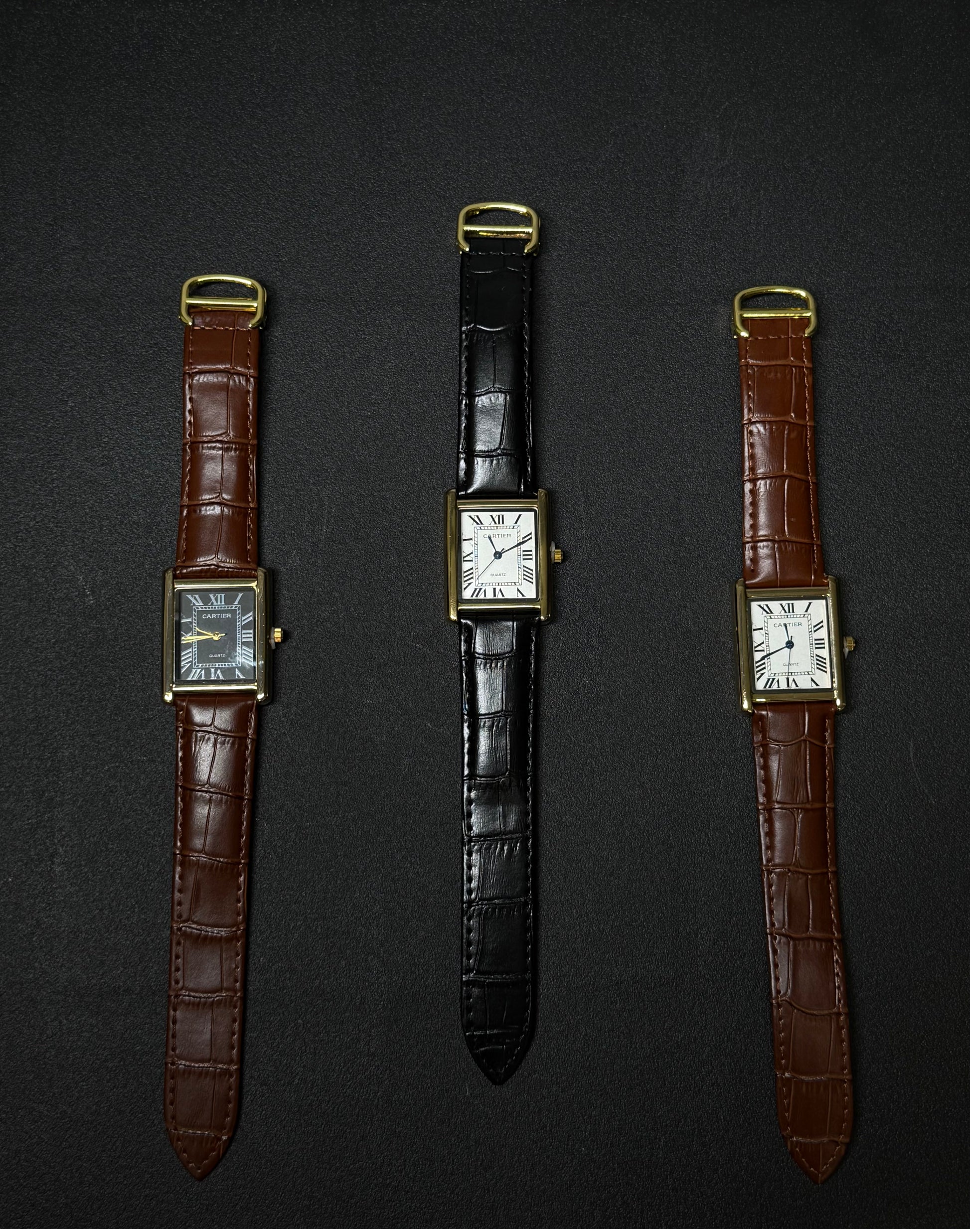 Replica watch collection with brown and black leather straps, rectangular Roman numeral dials and vintage-inspired dress watch design