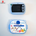 Blue instant camera with removable cartoon protective case.