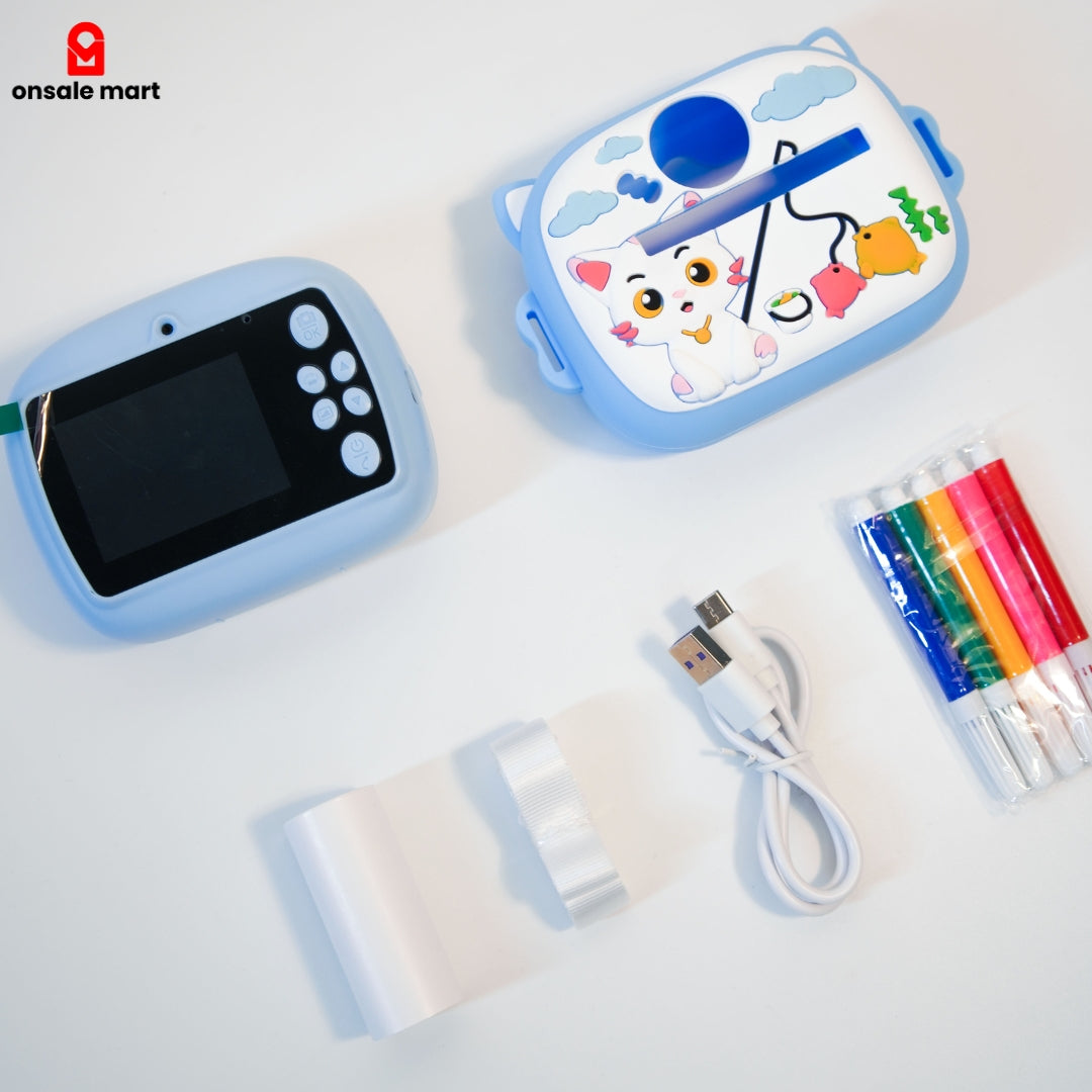 Kids instant print camera full set: camera, case, charging cable, print roll, markers.