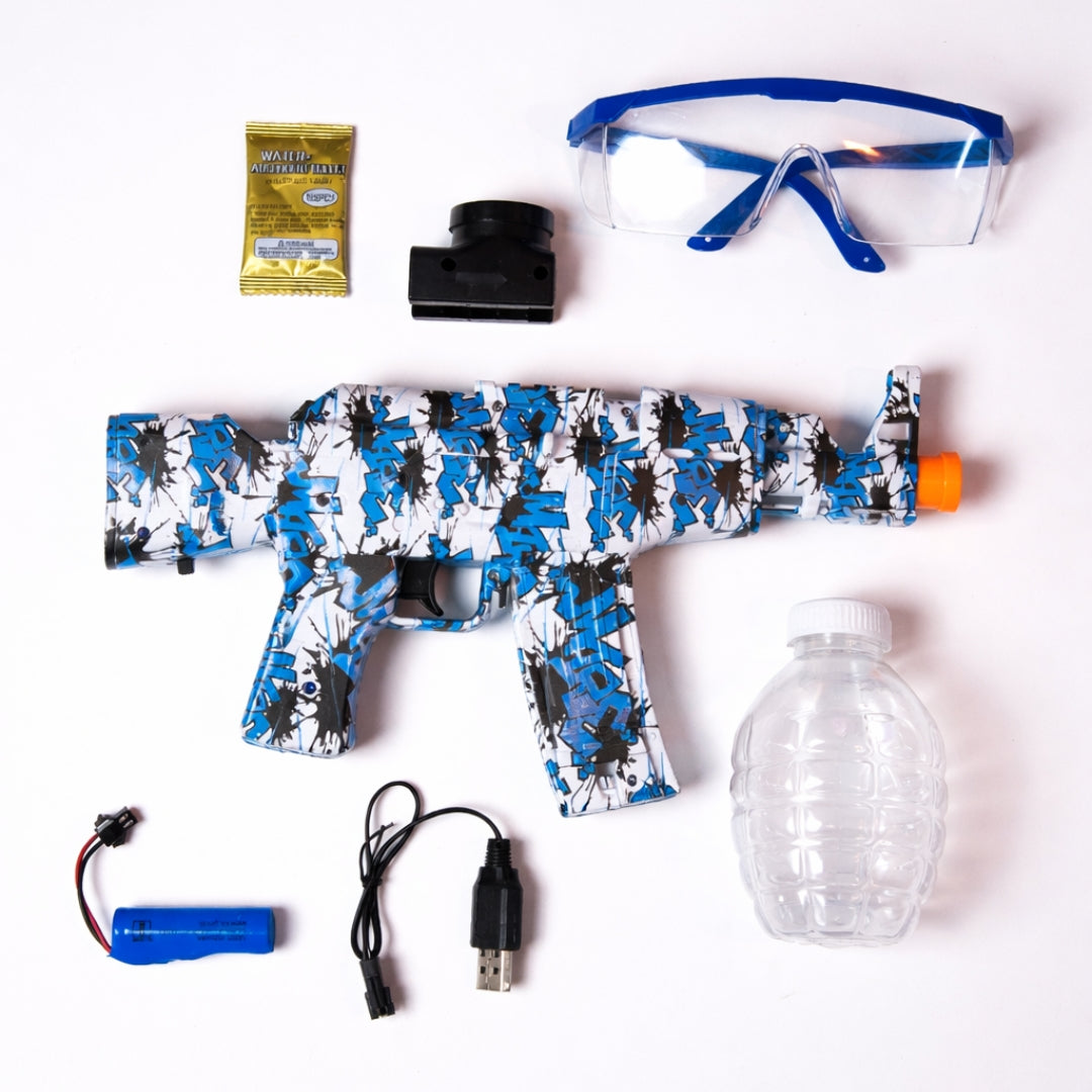 Top-down view of the Kids Electric Gel Blaster Gun Kit with Safety Glasses, featuring the gel blaster, safety glasses, gel ball packets, water bottle container, USB cable, and rechargeable battery.