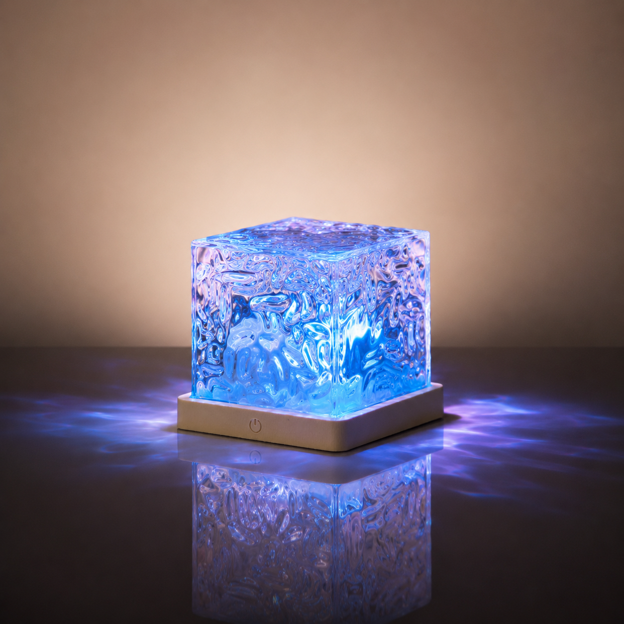 Ocean Aura LED Night Lamp with crystal acrylic design and soothing blue water wave glow on tabletop