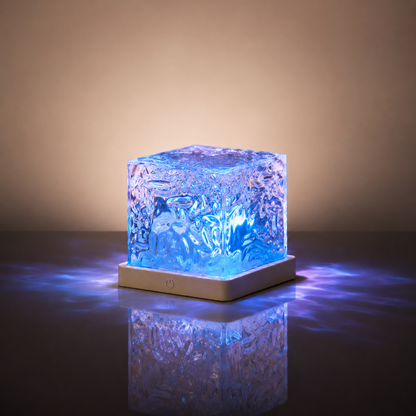 Ocean Aura LED Night Lamp with crystal acrylic design and soothing blue water wave glow on tabletop