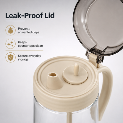 Lexi Glass Oil Dispenser with Brush displaying leak-proof flip-top lid, anti-drip pouring spout, secure oil storage and clean countertop kitchen solution.