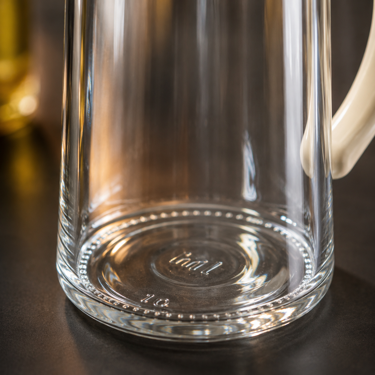 Close-up of Lexi Glass Oil Dispenser with Brush showcasing thick durable glass construction, crystal-clear transparency and premium kitchen oil storage design.