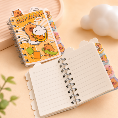 Little Moments Mini Journal open spiral-bound notebook with lined writing pages, cute character tab dividers, premium paper, and compact pocket-sized design for journaling and planning.