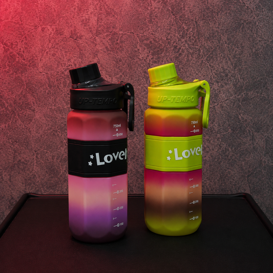 Lovely Grip 750ml Water Bottle available in pink-black and green-pink colour options with measurement markings and easy-carry handle.