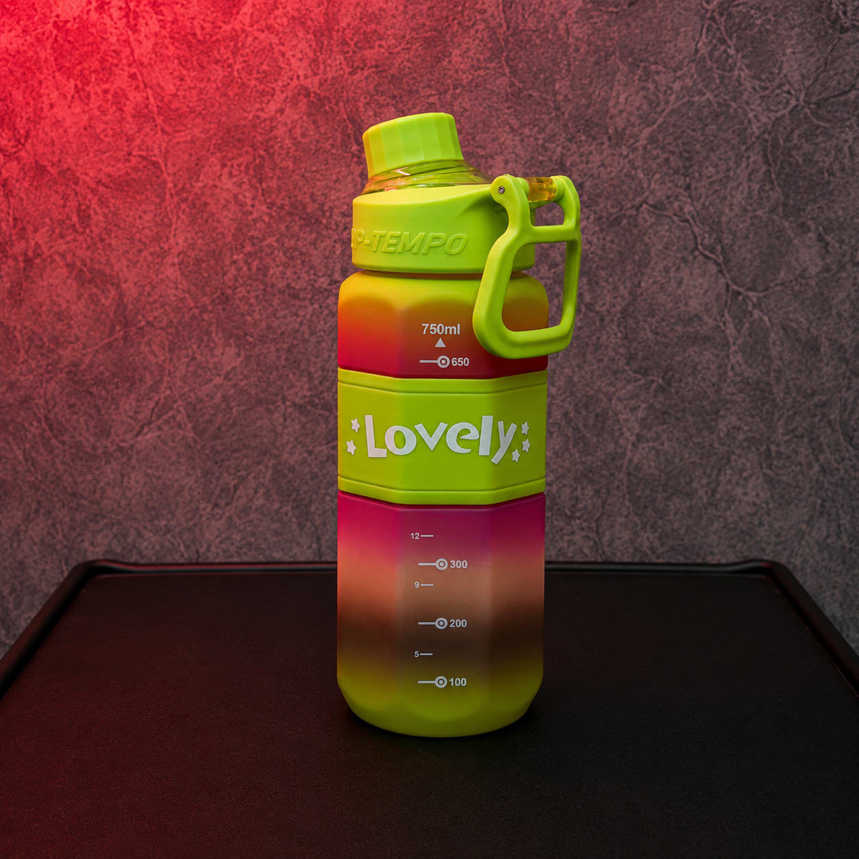 Lovely Grip 750ml Water Bottle in green and pink gradient finish featuring carry handle, hydration scale, and reusable sports bottle design.