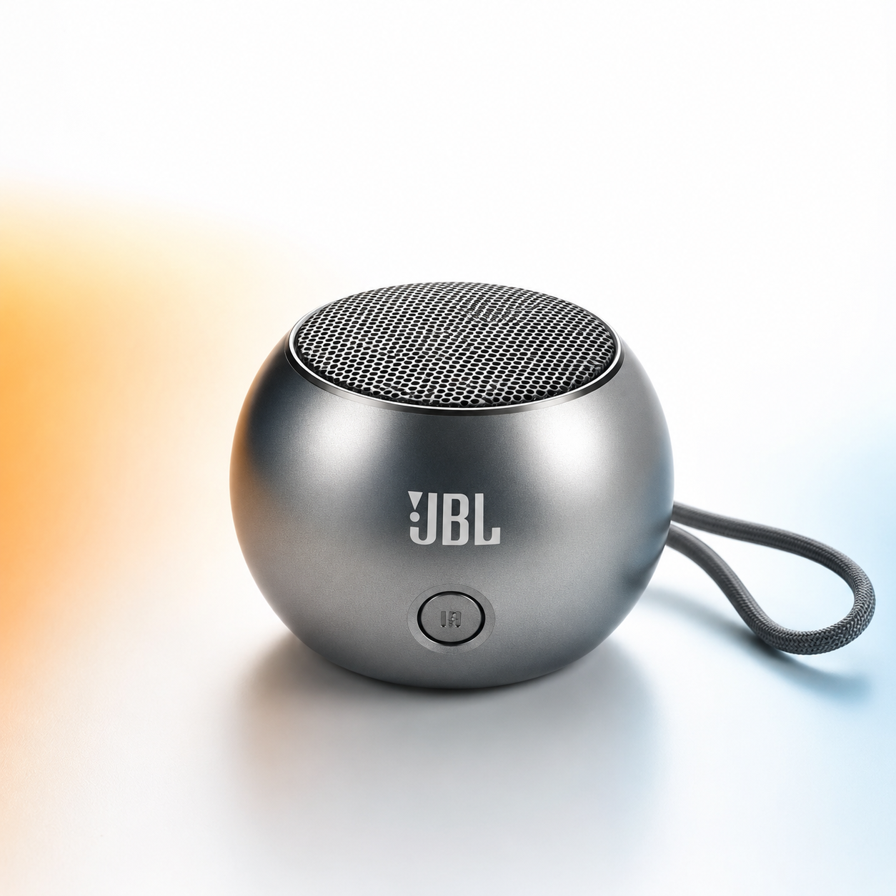 Compact Mini Boost 004 metal Bluetooth speaker with a premium aluminium alloy body, integrated lanyard, one-key control button, and portable pocket-sized design