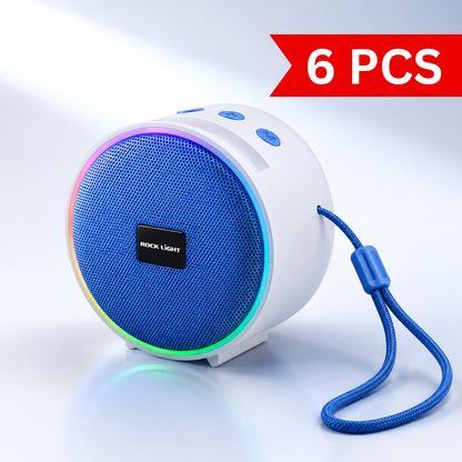 Portable RGB Bluetooth speaker with colourful LED lighting, blue front grille, integrated carry strap, rechargeable battery and compact design for indoor and outdoor music playback.
