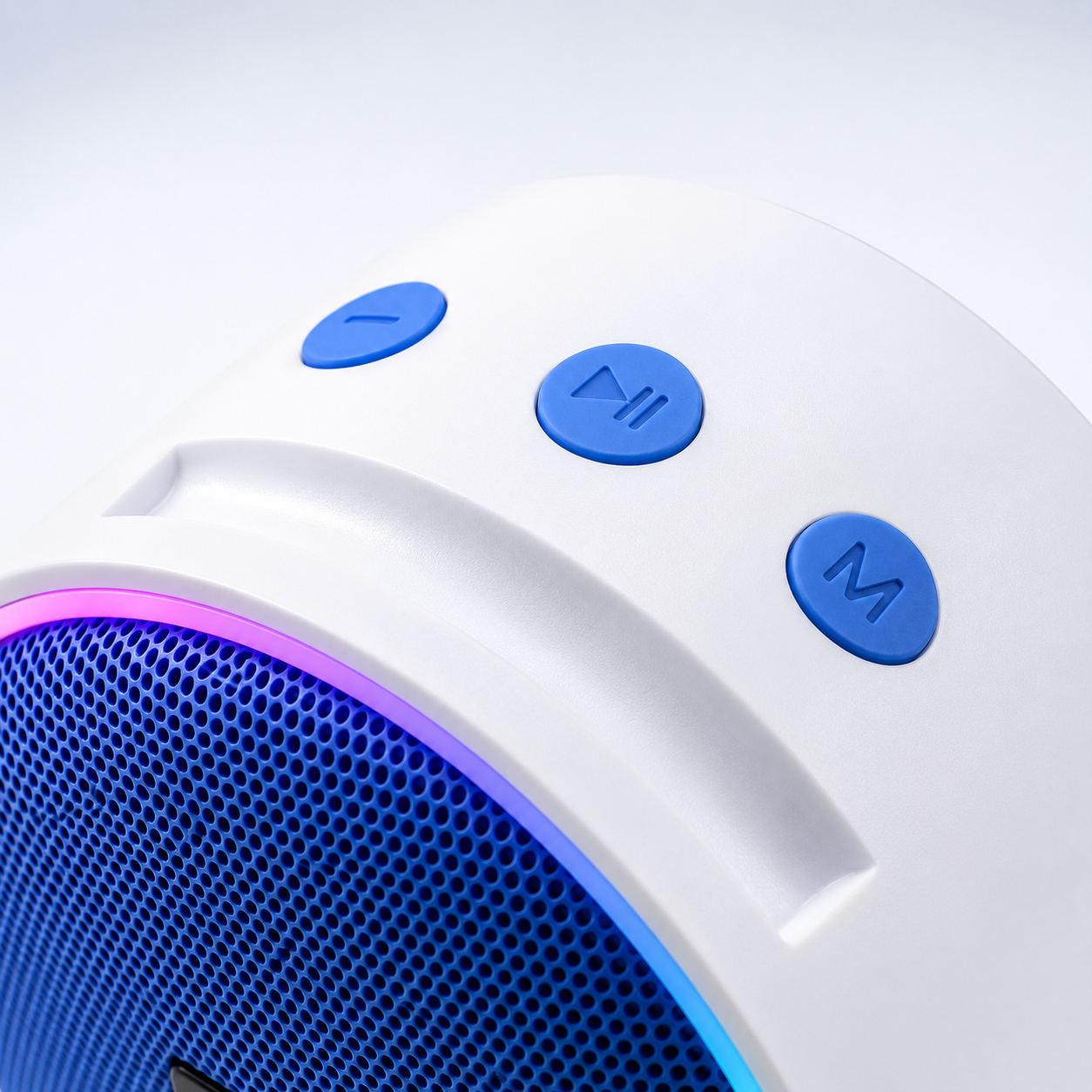 Close-up of the portable wireless speaker's top control panel with play/pause, mode and volume buttons for easy music playback and audio control.