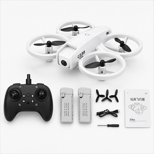 Mini camera drone package contents including drone, remote controller, two batteries, spare propellers, USB charging cable, screwdriver and user manual.