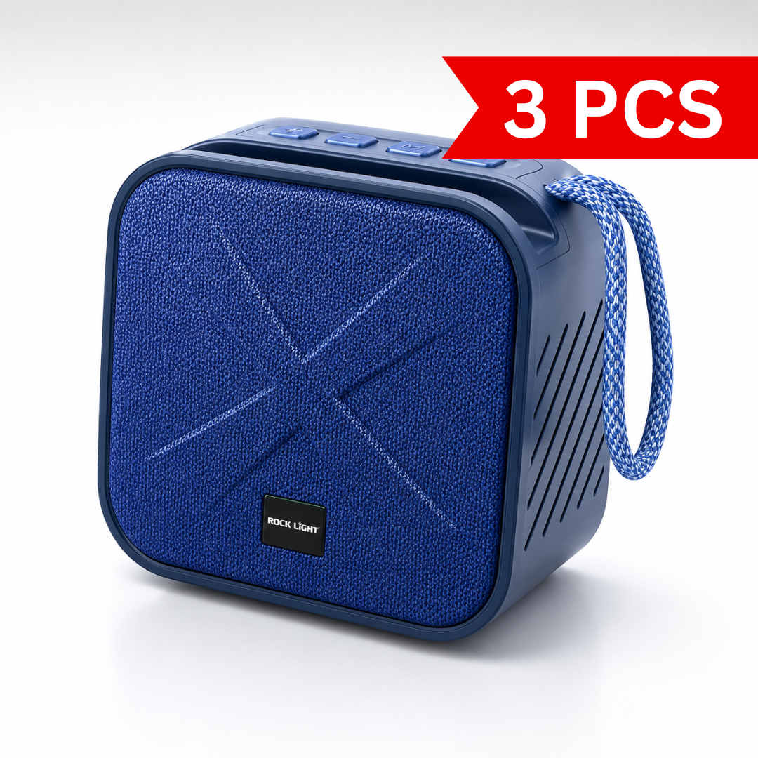 Portable Bluetooth wireless speaker in blue color with textured fabric front grille, integrated carry strap, top-mounted control buttons, compact square design, and modern portable audio styling