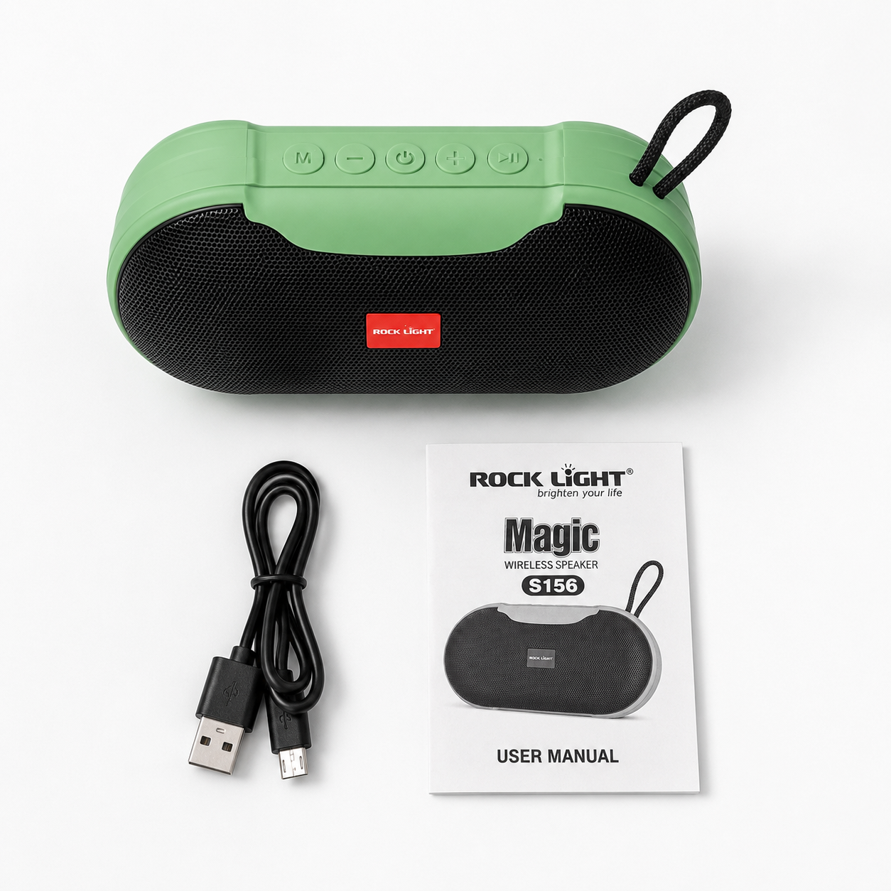 Rock Light Magic S156 portable wireless speaker displayed with USB charging cable and user manual on a clean white background, showcasing included accessories and packaging contents.