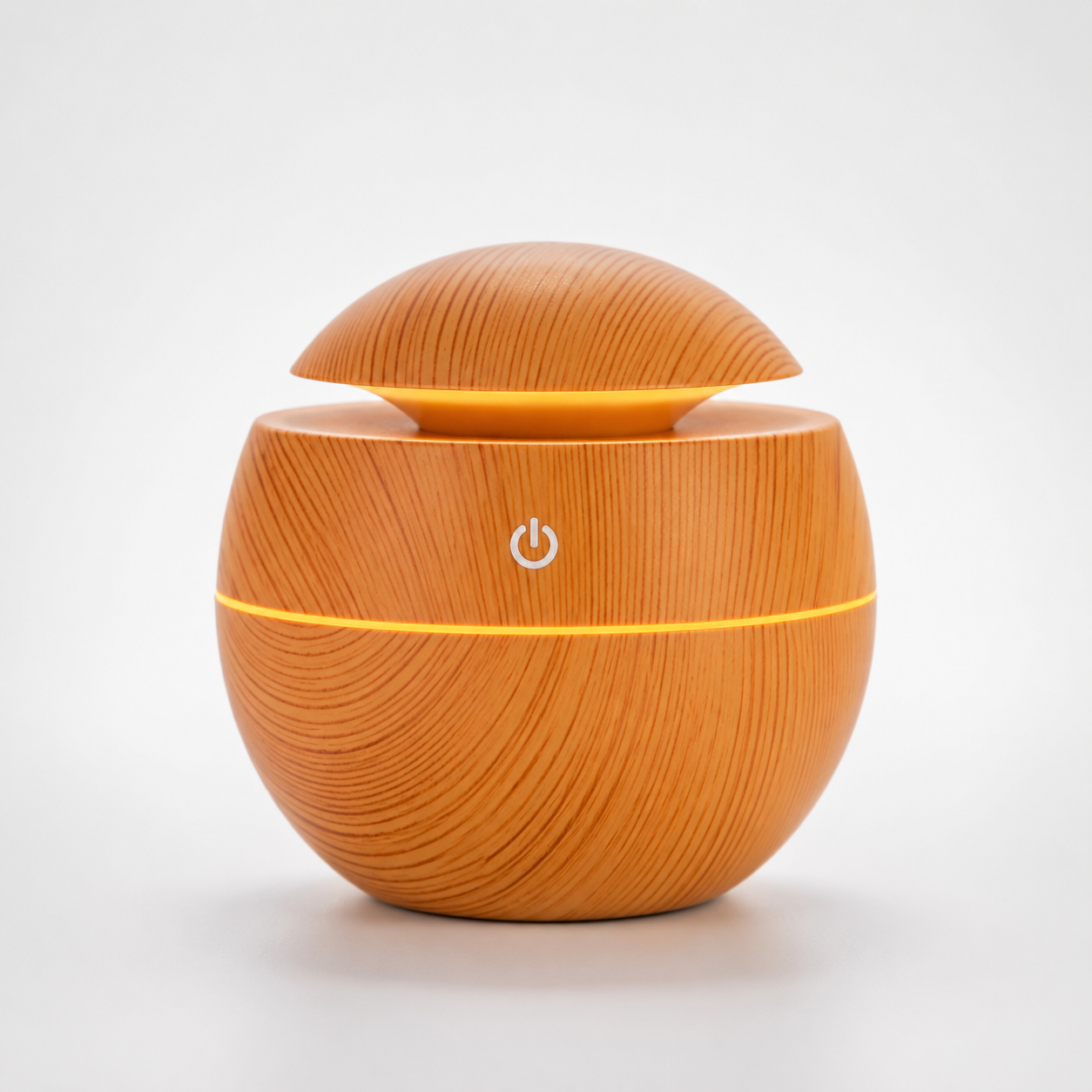 Wood grain Mini Aroma Humidifier with LED ambient light and ultrasonic mist technology for bedroom, office desk, and living room.